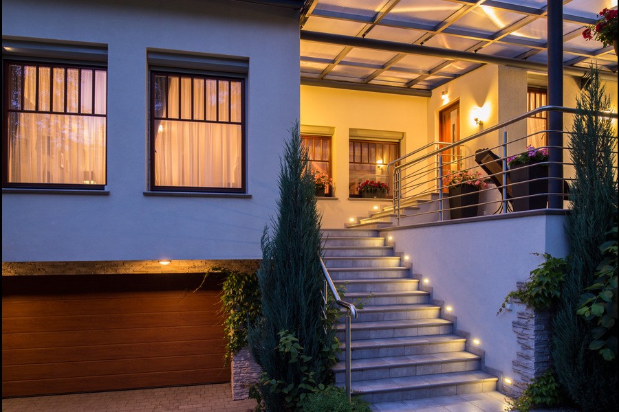 Outdoor area with controlled lighting