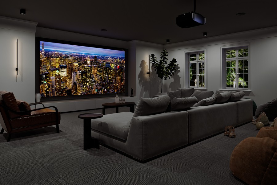 a home theater design with a projector, gray seating, and dimmed lights