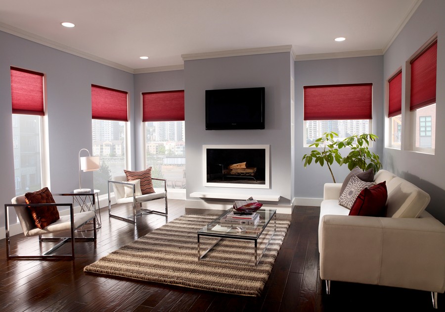 Gray shades installed on the windows of a bedroom